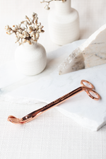 Load image into Gallery viewer, Champagne Rose Gold coloured wick trimmer for candle care.
