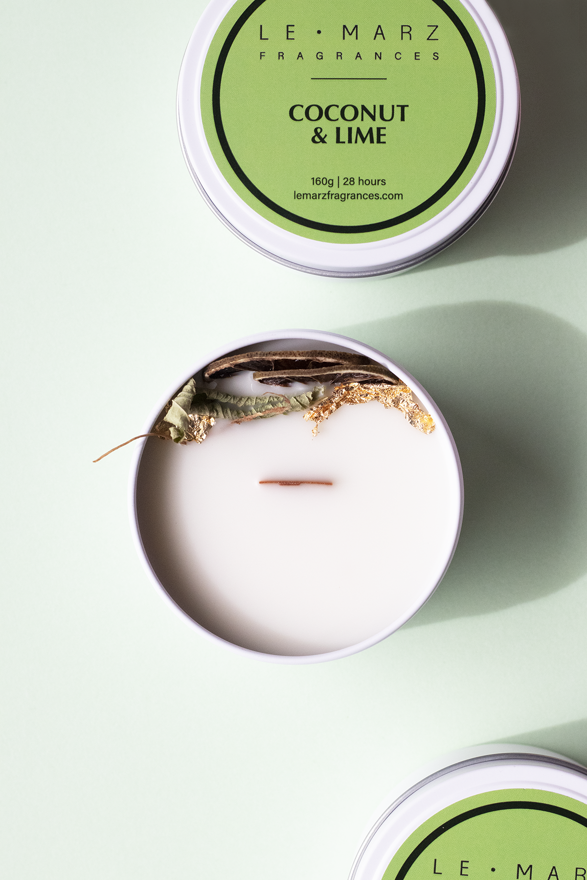 Coconut and Lime sensory mini travel tin wood wick candle with dehydrated botanicals. Fresh, fruity and floral scented candle for gift or home decor or home fragrances