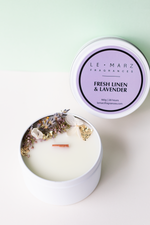 Load image into Gallery viewer, ‘Sensory Collection’ is our miniature wood wick candle range. Mini travel tin wood wick candle with dehydrated botanicals aesthetics. Fresh, fruity and floral scented candle for gift or home decor or home fragrances. Fresh Linen and Lavender candle
