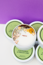 Load image into Gallery viewer, ‘Sensory Collection’ is our miniature wood wick candle range. Mini travel tin wood wick candle with dehydrated botanicals aesthetics. Fresh, fruity and floral scented candle for gift or home decor or home fragrances. Lemongrass and Persian lime candle

