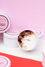 Load image into Gallery viewer, ‘Sensory Collection’ is our miniature wood wick candle range. Mini travel tin wood wick candle with dehydrated botanicals aesthetics. Fresh, fruity and floral scented candle for gift or home decor or home fragrances. Champagne and strawberries candle
